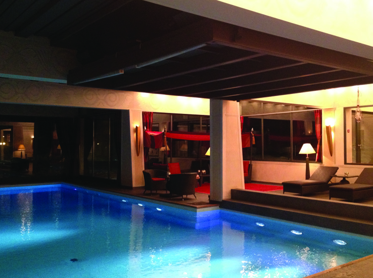 Gstaad Palace Indoor pool area complete with full bar.