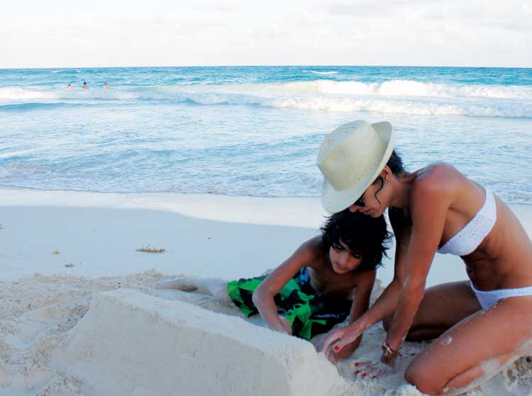 Casa Violeta Building a sandcastle with Jivan...beachy, bronzed and relaxed.  