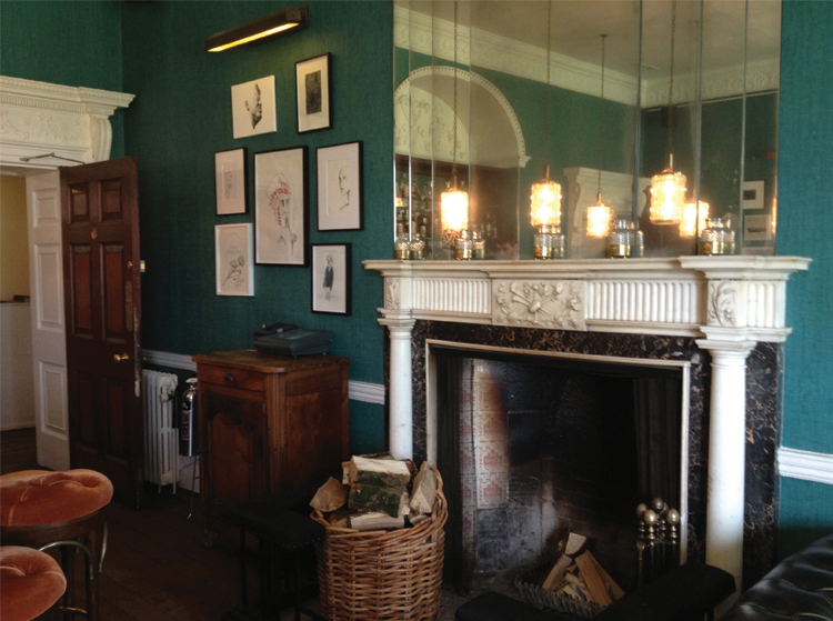 Babington House Cozy time fireplace in the bar zone. 