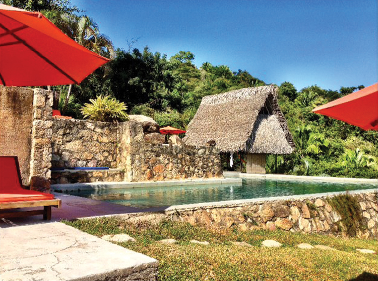 Verana Serene hillside pool overlooking the ocean.
