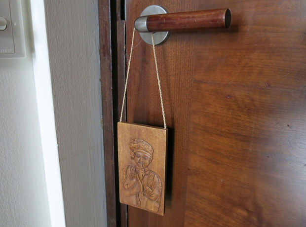 The Chedi Do Not Disturb sign.