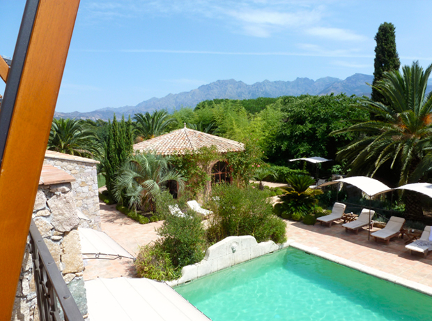 La Signoria A view of the hotel pool and the Corsican mountains <br></noscript> from the restaurant. 