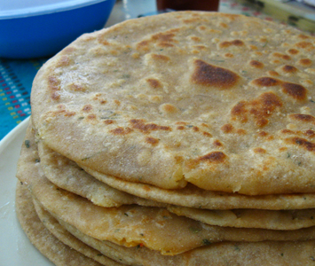 this is a roadside diner (and supports my theory that in Asia, the best food is always to be found in them), with THE MOST unbelievable chicken paratha for about 30c. Once you get over your food fears, seek it out. Authentic, killer Sri Lankan food.
