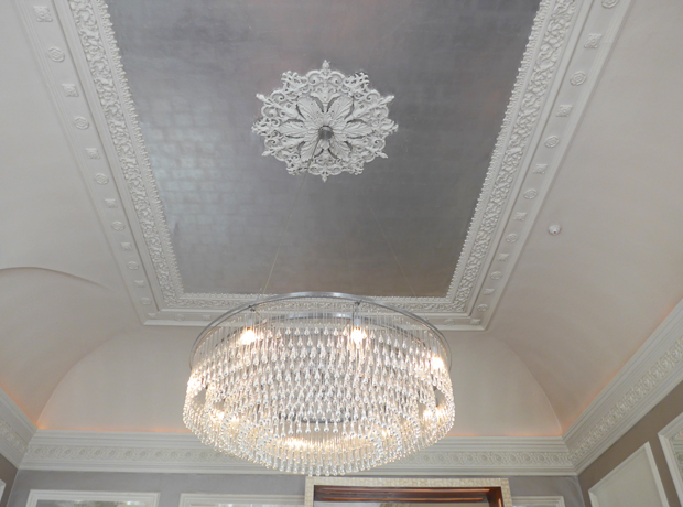 The Bingham The ornate ceiling in the bar with crystal drop chandelier. The interiors are opulent and classic in keeping with the history of the hotel.