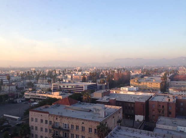 The Line Yeah and that’s the view from the floor-to-ceiling windows: Hollywood Hills in the distance beyond the haze, palm trees and old warehouses of Koreatown below. 