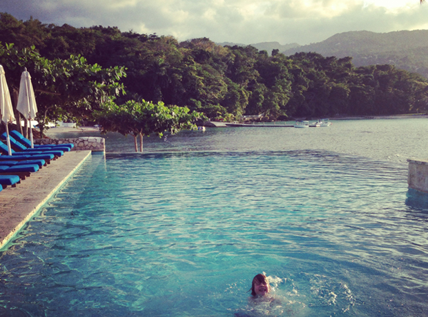 Round Hill This was taken of my son two seconds after we arrived from the airport in the infinity pool overlooking the ocean. So beautiful.