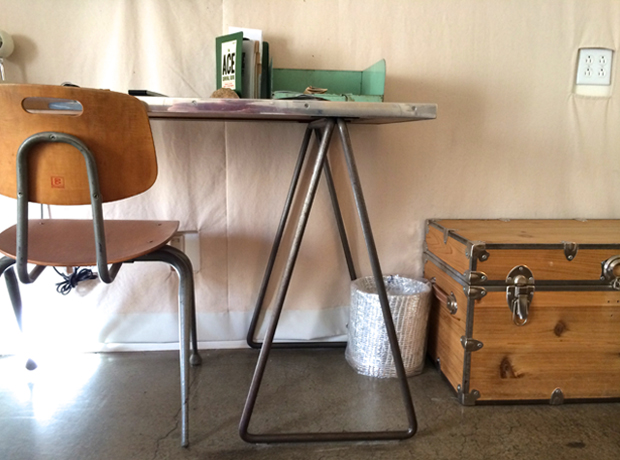 Ace Hotel & Swim Club Canvas-covered walls & concrete floors. There was a nice record player and vinyls by the bed, but I forgot to take a picture of them... so you’re getting the vintage desk instead.