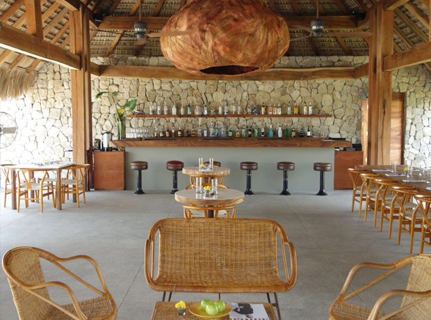 Hotel Escondido The bar and restaurant. That huge lantern above the bar is made of palm fronds. A lively vibe kicks off around 9pm each night as couples finish dinner and the mezcal starts to flow. 