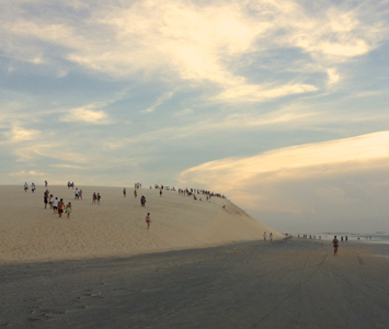 Watch the sun set with the locals at the “big dune” in Jericoacoara