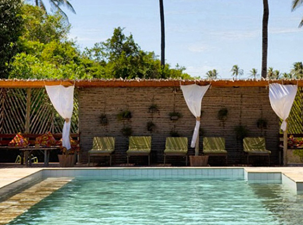 Rancho do Peixe Relaxing poolside.