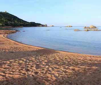 Rent a moped and drive to Isolella beach