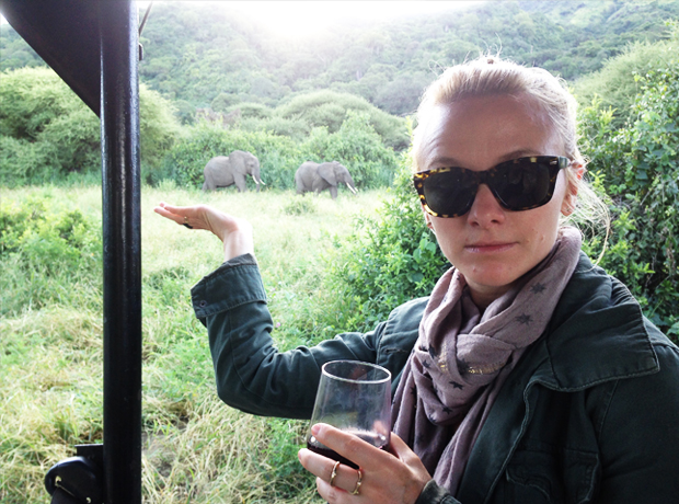 Ngorongoro Crater Lodge What...yes...obviously I'm drinking a glass of red and cruising past elephants. 