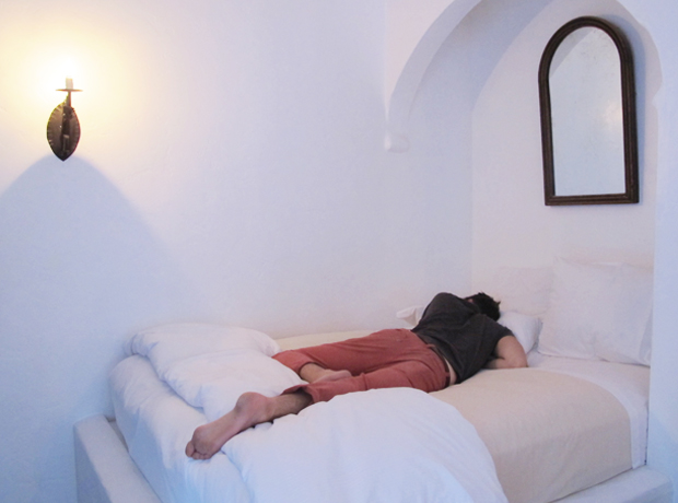 Korakia Pensione The bed in the Tangier Studio is built into an arched Moroccan alcove. Someone seems to like it.  