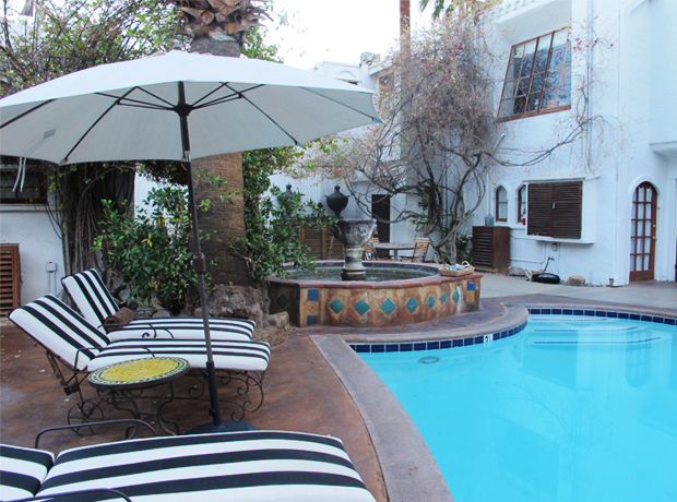 Korakia Pensione The centerpiece: a heated pool and chic striped lounges, overlooked by the Artist Studio's beautiful turret windows. (It's rumored Winston Churchill painted there). 