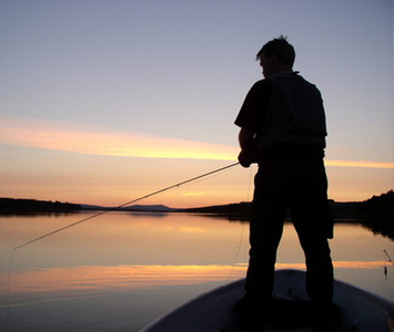 Fly-fishing with Kent in summer, dog-sledding in winter.