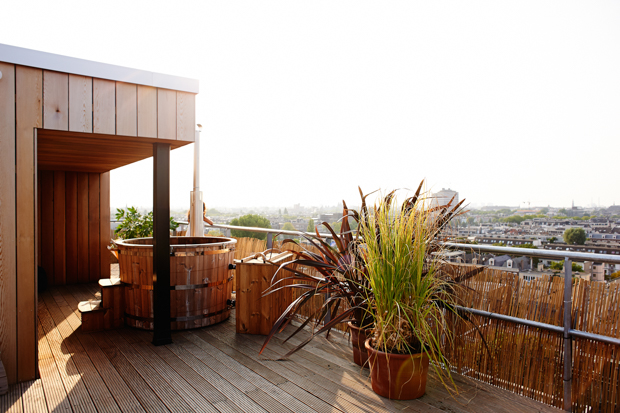 Volkshotel A gorgeous wooden hot tub on the rooftop.