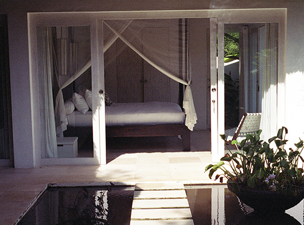 River Moon at Desa Bulan Villas The master bedroom facing the rice fields with comfy four poster king bed, duck down duvet and most importantly: mosquito net.