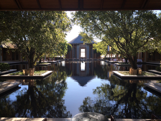 Amanyara Turks and Caicos Entrance of the hotel overlooking a reflection pool.
