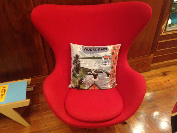 Hotel DeBrett Lobby pillow being cute.
