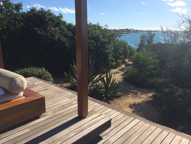 Amanyara Turks and Caicos Pool bed with view leading down to the water.