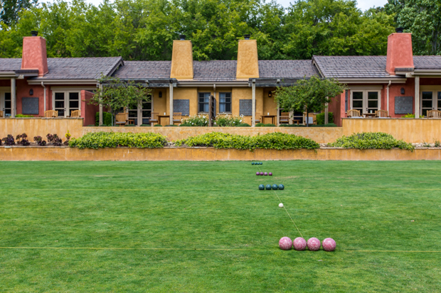 Bernardus Lodge & Spa A large courtyard lawn is set with bocce ball and croquet.
