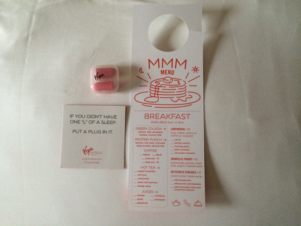 Virgin Hotels Chicago Room service breakfast menu and earplugs.

