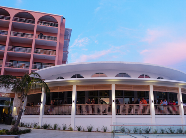 Hamilton Princess & Beach Club Sunset over Marcus' modern, panoramic space. 