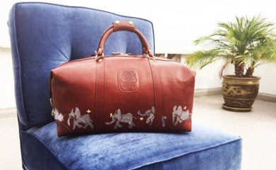 support our friends at kenya's sheldrick wildlife trust by bidding on one of these limited edition ghurka bags painted by donald robertson 
