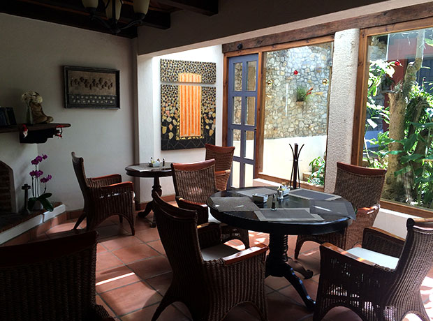 Guayaba Inn The dining area looks out onto the garden and the kitchen behind it is open so you can peek in. Breakfast here is fantastic and included daily until noon.