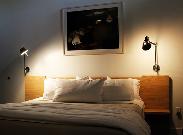 Hotel 404 The world’s most comfortable bed, made up with luxe Sferra linens.
