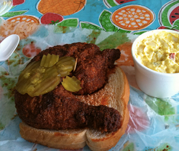 About a 20 minute trek from the city by car, Nashville's famous hot chicken joint where you’ll dine with the locals.