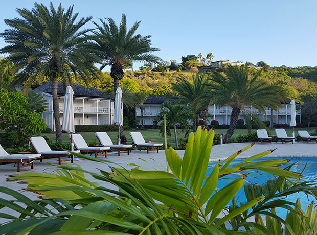 The Inn at English Harbour Looking out from the pool towards the hotel rooms.