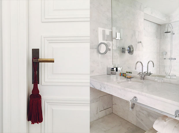 Hotel De Tourrel Floor to ceiling marble bathroom with l’Occitane products. Cute door details.
