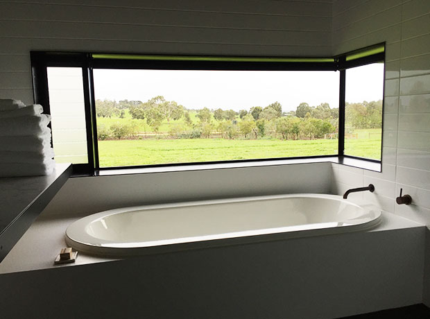 Brae Guest Suites Bathtub with a view out over the Otways. 