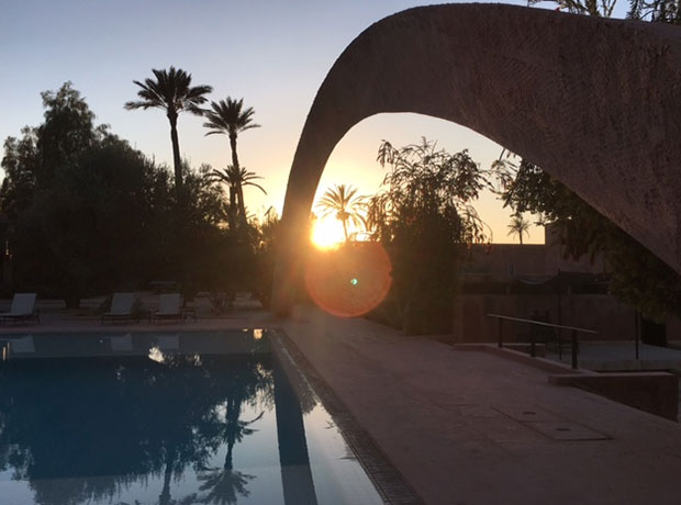 HOTEL DAR SABRA The artistic arch spans the pool at sunset.