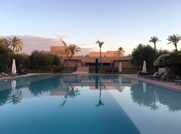 HOTEL DAR SABRA The pool during Golden Hour.