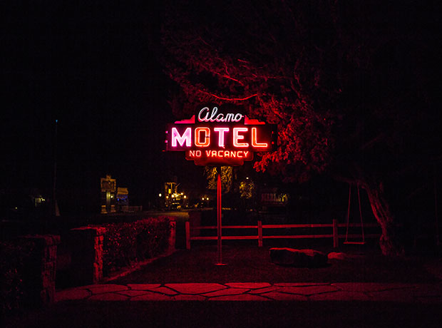 The Alamo Motel Red-hot vintage neon sign of the Alamo greets you at the entrance.