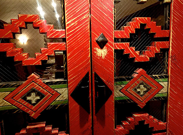 Rosewood Inn of the Anasazi Hand-carved doors to the hotel’s wine cellar, which is available for private dinners. The doors were blessed by the local Native American Hopi tribe.