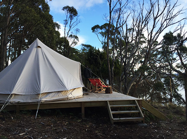 Satellite Island The yurt tucked into bushland on a cliff with incredible ocean views. 