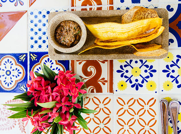 Hotel Esencia Instead of bread they bring plantains and vegetable chips with a spread made of pepitas (roasted pumpkin seeds) and tomatoes.