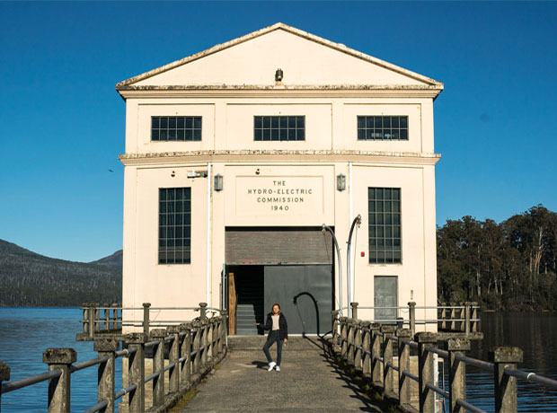 Pumphouse Point Me outside the Pumphouse. There are 12 rooms inside that sit 250m out over a lake. Access is by foot or golf buggy.  