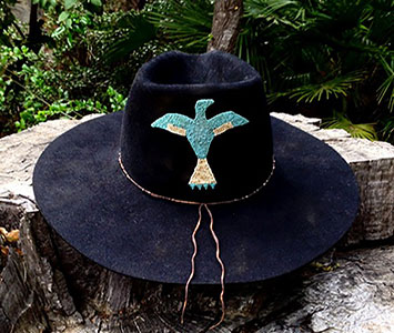 Wide brimmed hat.