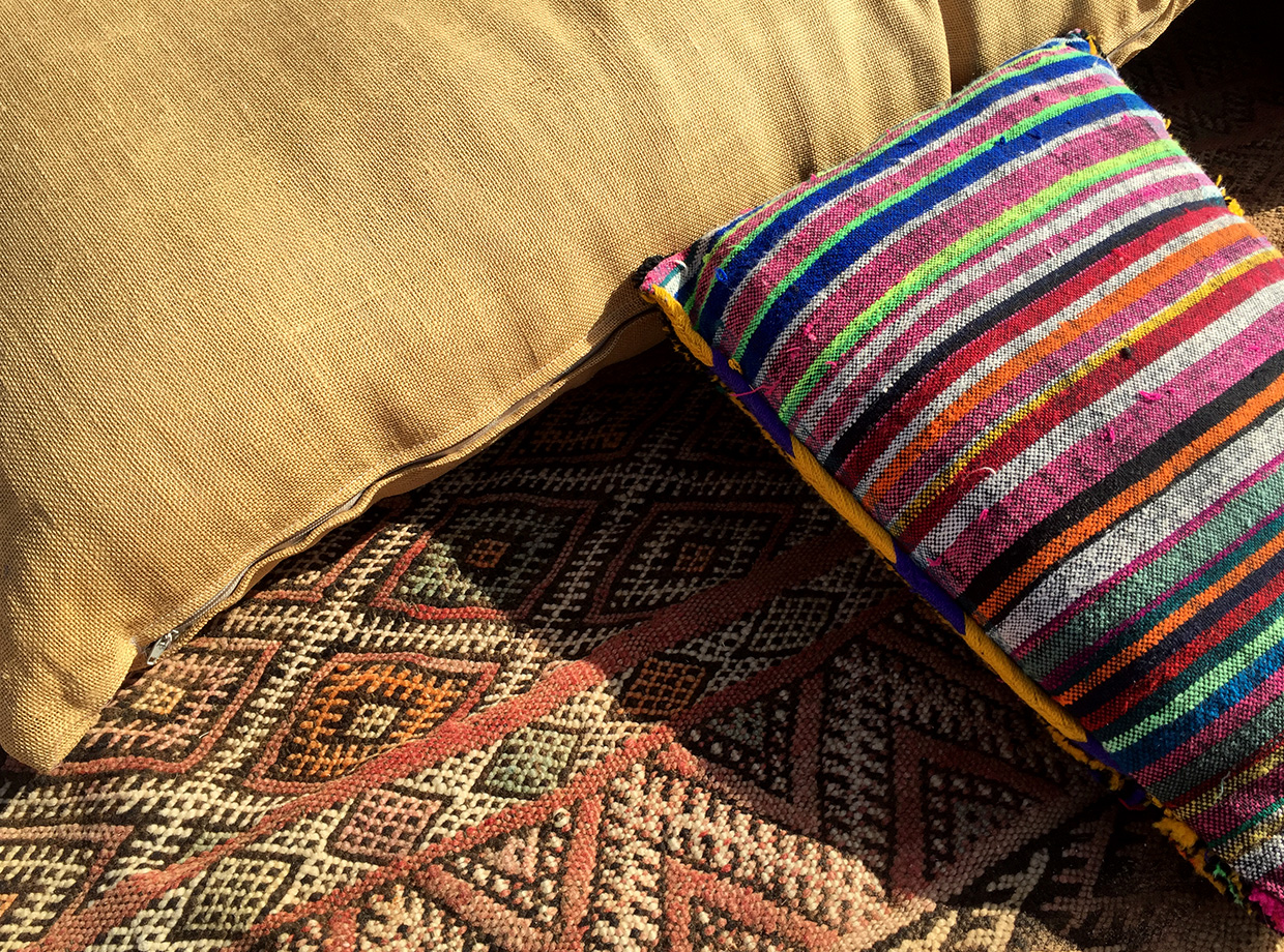 Kam Kam Dunes Patterns and traditional woven carpet around the camp.