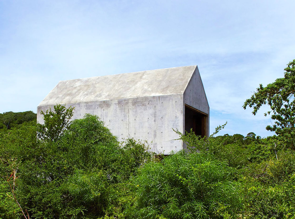 Casa Tiny Praying at the church of concrete.