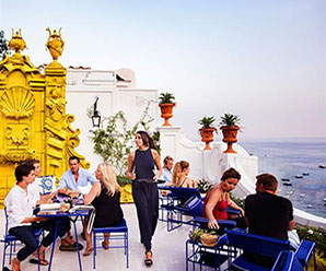 It's connected to the famous Le Sireneuse Hotel in Positano. Super chic yellow and blue tile gives it a cool vibe.