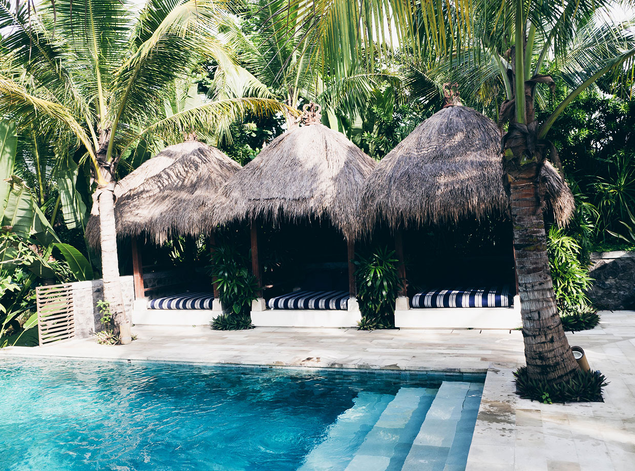 Hotel Komune Bali Relaxation area at the lap pool.