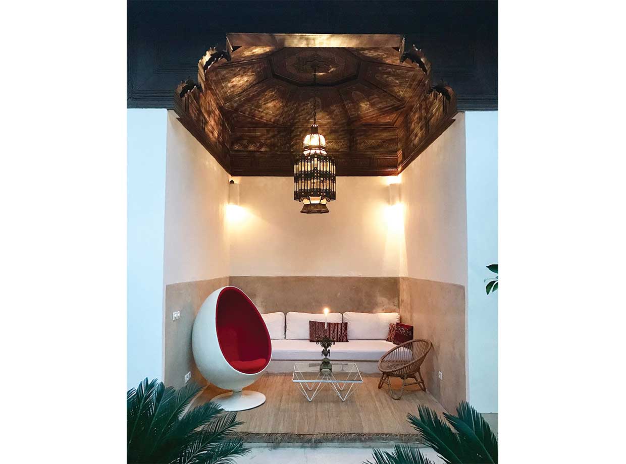 Riad Mena and Beyond One of many stylish indoor-outdoor nooks in which to relax.