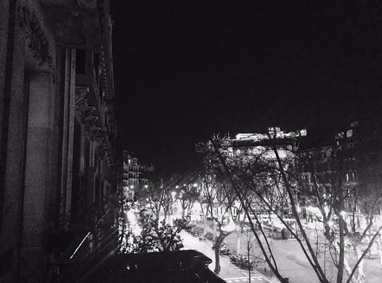 El Palauet Living Barcelona Evening looking up the Passeig de Grácia towards the hills.