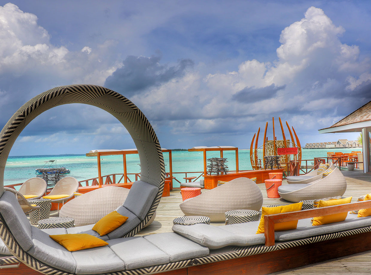 Lux* South Ari Atoll East Bar lounge deck by day. 