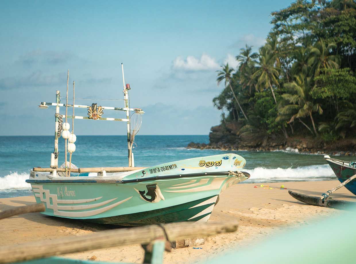 Talalla Retreat Fishing boats parked on the beach out front leave at dawn and return before dusk with a fresh catch for dinner.